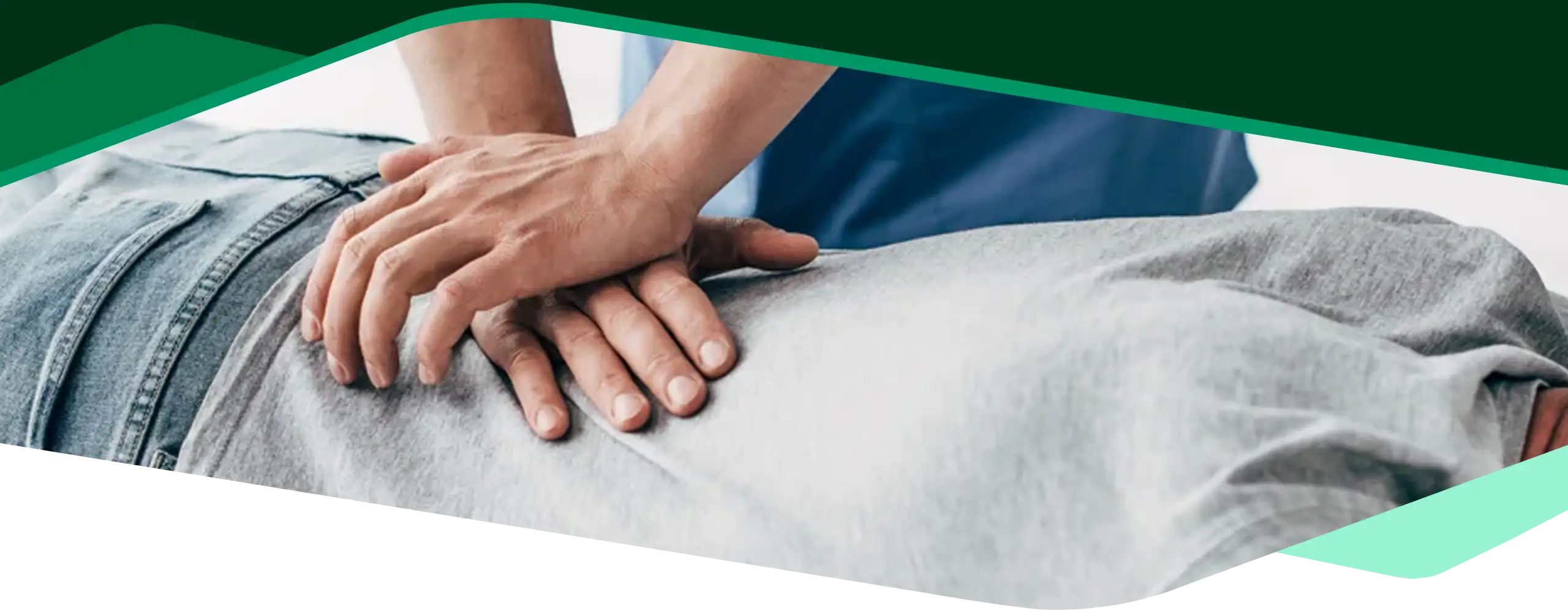 A person receiving a back adjustment.